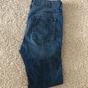 Mid rise, raw hem jeans